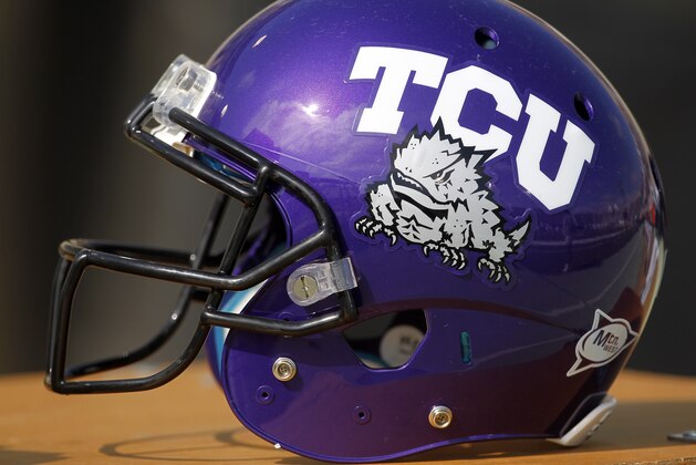 A TCU helmet sits on the bench  prior to an NCAA college football game between Colorado State and TCU  Saturday, Oct. 2, 2010, in Fort Collins.  (AP Photo/Jack Dempsey)