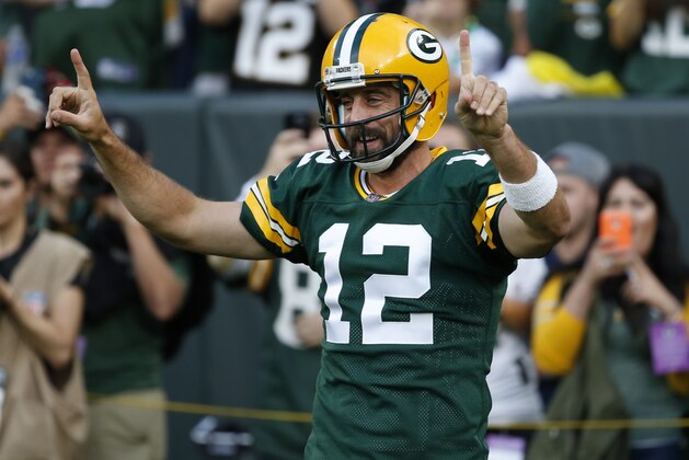 Green Bay Packers' Aaron Rodgers warms up before a preseason NFL football game against the Philadelphia Eagles Thursday, Aug. 10, 2017, in Green Bay, Wis. (AP Photo/Mike Roemer)