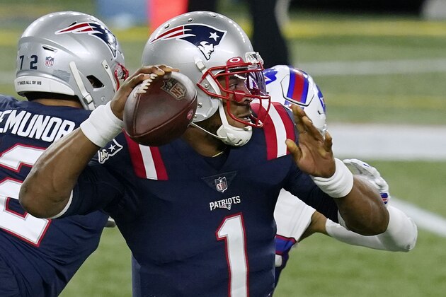 New England Patriots quarterback Cam Newton passes against the Buffalo Bills in the first half of an NFL football game, Monday, Dec. 28, 2020, in Foxborough, Mass. (AP Photo/Elise Amendola)