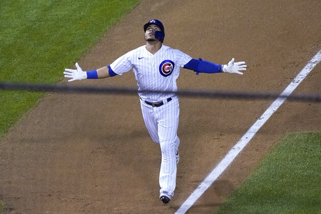 Chicago Cubs' Willson Contreras celebrates as he rounds the bases after hitting a solo home run during the sixth inning of a baseball game against the St. Louis Cardinals in Chicago, Friday, Sept. 4, 2020. (AP Photo/Nam Y. Huh)
