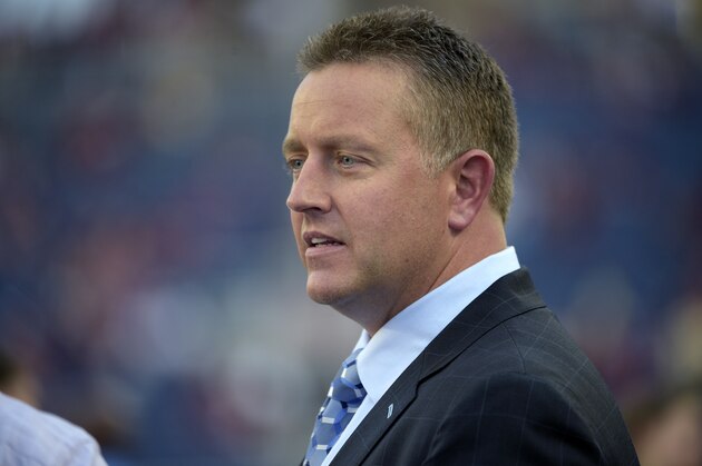 ESPN broadcaster Kirk Herbstreit watches warmups before an NCAA college football game between Florida State and Mississippi in Orlando, Fla., Monday, Sept. 5, 2016. Florida State won 45-34. (AP Photo/Phelan M. Ebenhack) ESPN broadcaster Kirk Herbstreit watches warmups before an NCAA college football game between Florida State and Mississippi in Orlando, Fla., Monday, Sept. 5, 2016. Florida State won 45-34. (AP Photo/Phelan M. Ebenhack)