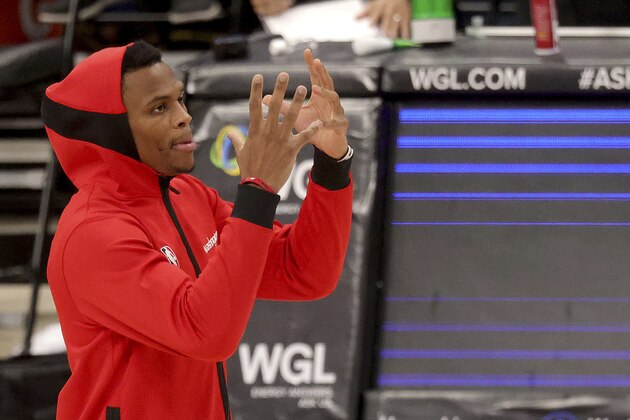 Washington Wizards Russell Westbrook reacts during a timeout in a preseason NBA basketball game against the Detroit Pistons, Saturday, Dec. 19, 2020 in Washington. (Rob Carr/Getty Images via AP, Pool)