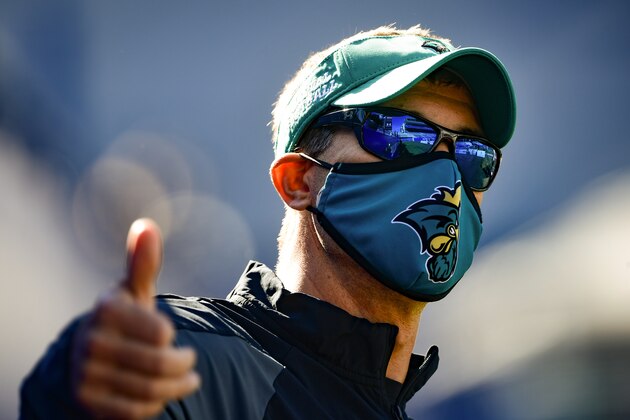 Coastal Carolina head coach Jamey Chadwell motions a thumbs up as he watches his players warm up before an NCAA football game against Georgia State, Saturday, Oct. 31, 2020, in Atlanta. (AP Photo/John Amis)