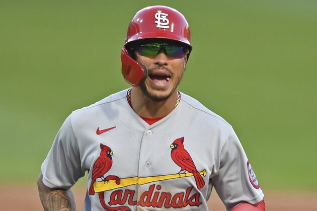 St. Louis Cardinals' Kolten Wong runs to the dugout during the ninth inning of a baseball game against the Pittsburgh Pirates, Sunday, Sept. 20, 2020, in Pittsburgh. The Pirates won 2-1. (AP Photo/David Dermer)
