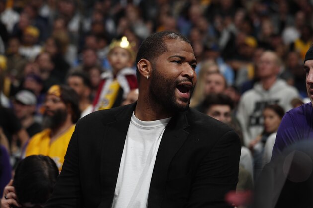 Injured Los Angeles Lakers center DeMarcus Cousins (15) in the second half overtime of an NBA basketball game Wednesday, Feb. 12, 2020, in Denver. The Lakers won 120-116 in overtime. (AP Photo/David Zalubowski)