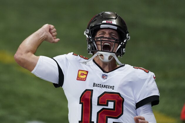 Tampa Bay Buccaneers quarterback Tom Brady (12) warms up before the first half of an NFL football game between the Atlanta Falcons and the Tampa Bay Buccaneers, Sunday, Dec. 20, 2020, in Atlanta. (AP Photo/John Bazemore)