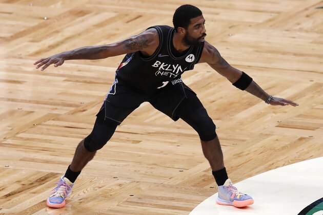 Brooklyn Nets' Kyrie Irving plays against the Boston Celtics during the first half of an NBA basketball game, Friday, Dec. 25, 2020, in Boston. (AP Photo/Michael Dwyer) Brooklyn Nets' Kyrie Irving plays against the Boston Celtics during the first half of an NBA basketball game, Friday, Dec. 25, 2020, in Boston. (AP Photo/Michael Dwyer)