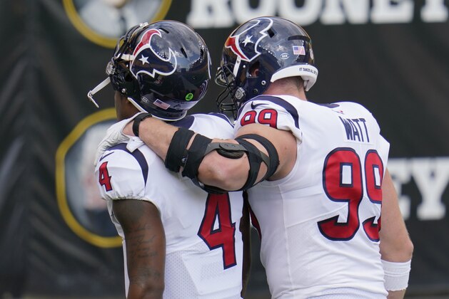 Houston Texans defensive end J.J. Watt (99) and quarterback Deshaun Watson (4) walk off the field following warm ups before an NFL football game against the Pittsburgh Steelers in Pittsburgh, Sunday, Sept. 27, 2020. (AP Photo/Gene J. Puskar) Houston Texans defensive end J.J. Watt (99) and quarterback Deshaun Watson (4) walk off the field following warm ups before an NFL football game against the Pittsburgh Steelers in Pittsburgh, Sunday, Sept. 27, 2020. (AP Photo/Gene J. Puskar)
