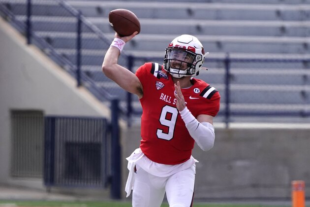 Ball State quarterback Drew Plitt (9) throws downfield against San Jose State in the first half of the Arizona Bowl NCAA college football game, Thursday, Dec. 31, 2020, in Tucson, Ariz. (AP Photo/Rick Scuteri)
