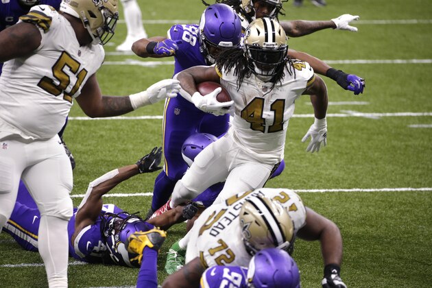 New Orleans Saints running back Alvin Kamara (41) carries for his fifth touchdown of the game, in the second half of an NFL football game against the Minnesota Vikings54 in New Orleans, Friday, Dec. 25, 2020. (AP Photo/Butch Dill)