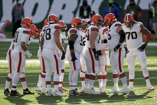Cleveland Browns offensive tackle Jack Conklin (78) huddles with teammates during an NFL football game against the New York Jets, Sunday, Dec. 27, 2020, in East Rutherford, N.J. (AP Photo/Adam Hunger)