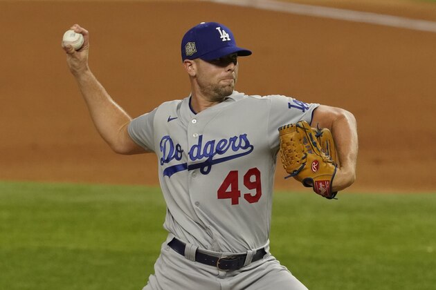 Los Angeles Dodgers relief pitcher Blake Treinen throws against the Tampa Bay Rays during the seventh inning in Game 3 of the baseball World Series Friday, Oct. 23, 2020, in Arlington, Texas. (AP Photo/Tony Gutierrez)