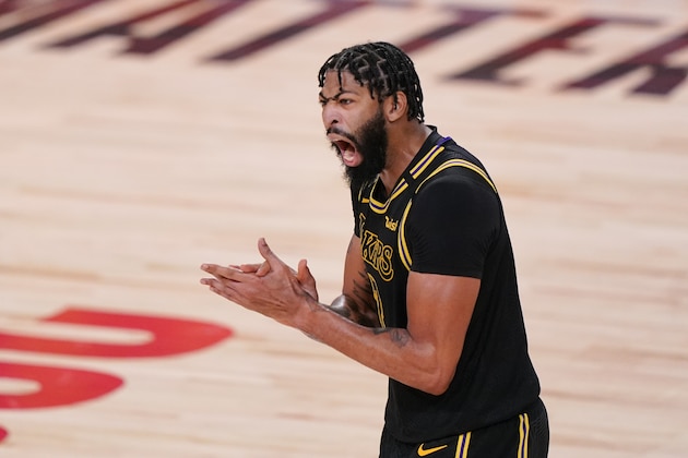 Los Angeles Lakers forward Anthony Davis celebrated during the second half in Game 5 of basketball's NBA Finals against the Miami Heat Friday, Oct. 9, 2020, in Lake Buena Vista, Fla. (AP Photo/Mark J. Terrill)