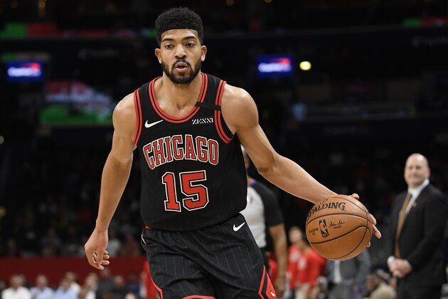 Chicago Bulls forward Chandler Hutchison (15) dribbles the ball during the first half of an NBA basketball game against the Washington Wizards, Tuesday, Feb. 11, 2020, in Washington. (AP Photo/Nick Wass)