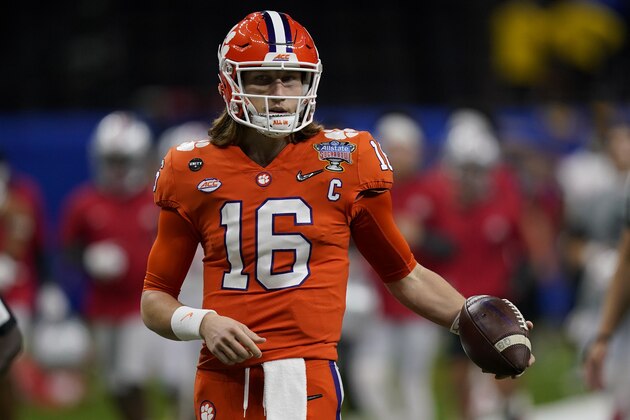 Clemson quarterback Trevor Lawrence warms up before the Sugar Bowl NCAA college football game against Ohio State Friday, Jan. 1, 2021, in New Orleans. (AP Photo/Gerald Herbert)