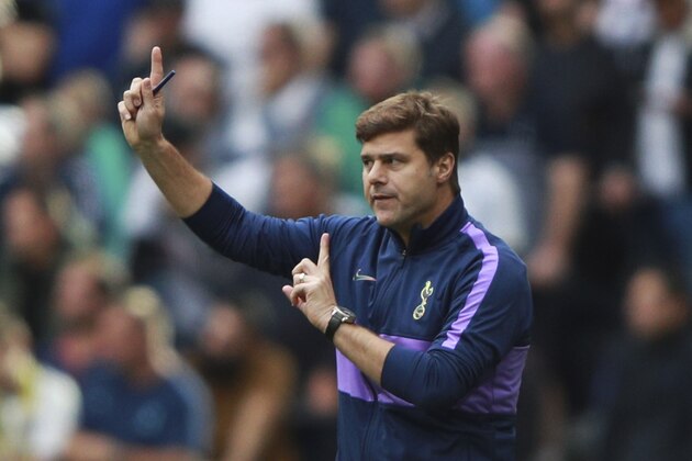 Tottenham's manager Mauricio Pochettino gives directions to his players during the English Premier League soccer match between Tottenham Hotspur and Southampton at the White Heart Lane stadium in London, Saturday, Sept. 28, 2019. (AP Photo/Ian Walton)