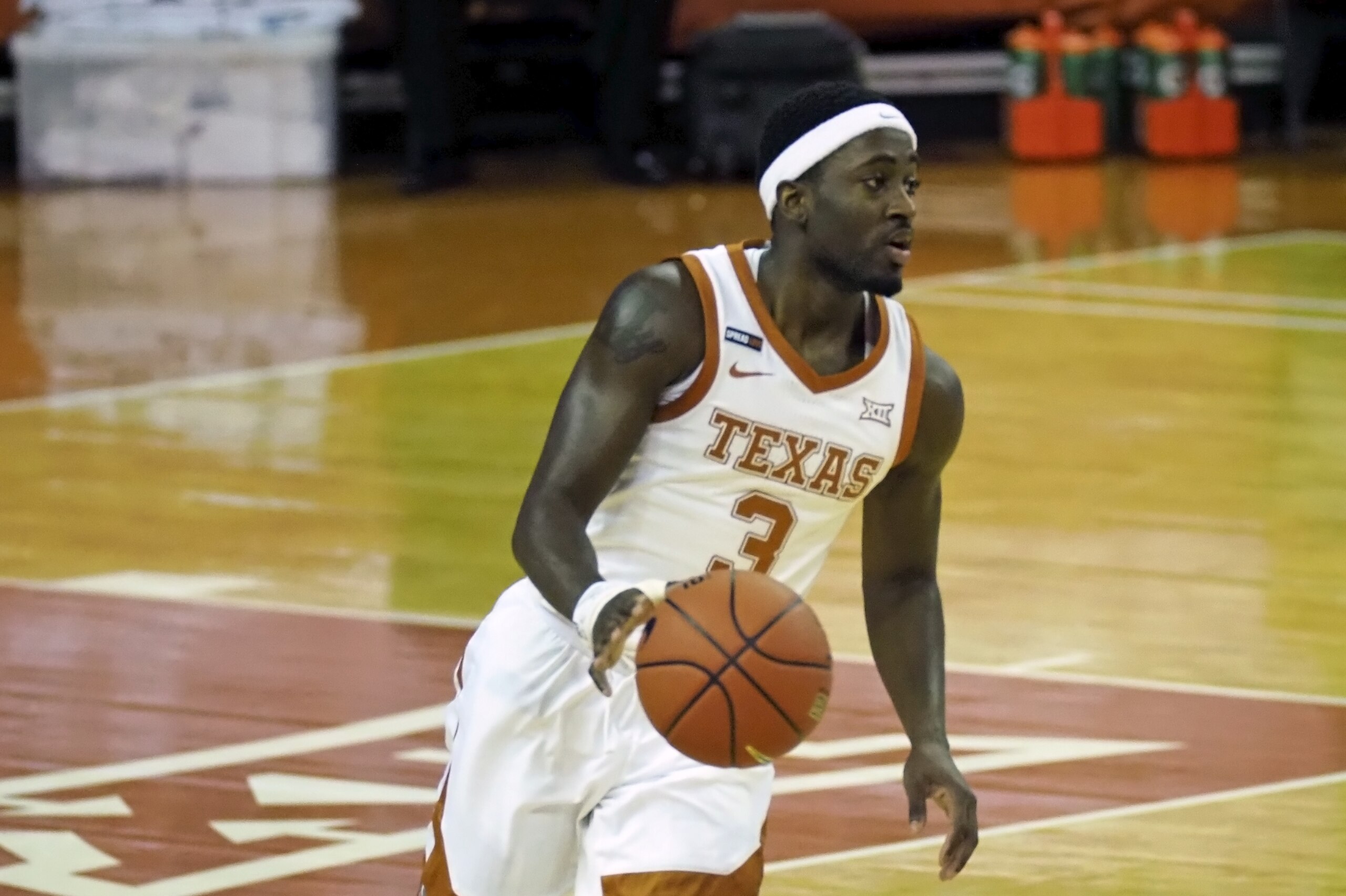 Texas guard Courtney Ramey dribbles during the first half of an NCAA college basketball game against Villanova, Sunday, Dec. 6, 2020, in Austin, Texas. (AP Photo/Michael Thomas)