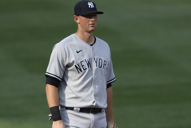 New York Yankees' DJ LeMahieu stands on the field during the first baseball game of a doubleheader against the Baltimore Orioles, Friday, Sept. 4, 2020, in Baltimore. (AP Photo/Nick Wass)