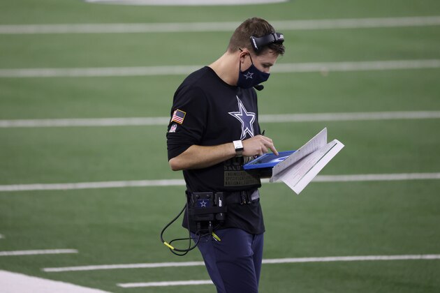 Dallas Cowboys offensive coordinator Kellen Moore stands on the sideline during the second half of an NFL football game against the Pittsburgh Steelers in Arlington, Texas, Sunday, Nov. 8, 2020. (AP Photo/Ron Jenkins)
