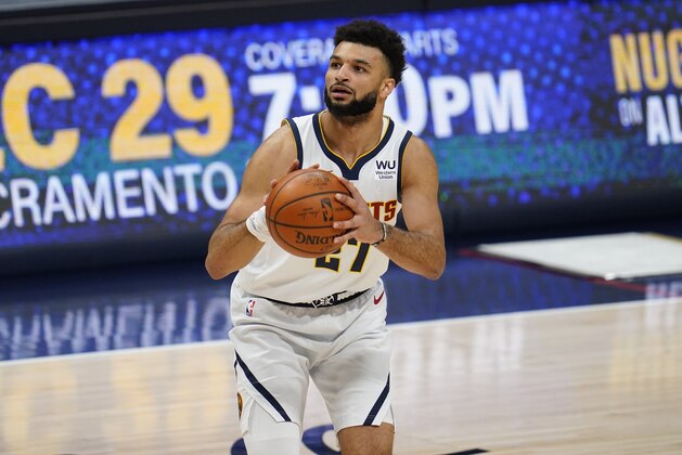 Denver Nuggets guard Jamal Murray (27) in the first half of an NBA basketball game Monday, Dec. 28, 2020, in Denver. (AP Photo/David Zalubowski)