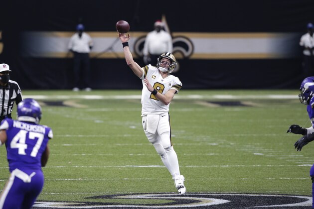 New Orleans Saints quarterback Drew Brees (9) passes in the second half of an NFL football game against the Minnesota Vikings in New Orleans, Friday, Dec. 25, 2020. During the game, Brees became the first NFL player to reach 8,000 yards passing . The Saints won 52-33. (AP Photo/Butch Dill)