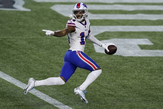 Buffalo Bills wide receiver Stefon Diggs crosses the goal line for a touchdown after catching a pass in the first half of an NFL football game against the New England Patriots, Monday, Dec. 28, 2020, in Foxborough, Mass. (AP Photo/Elise Amendola)
