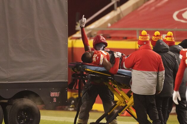 Kansas City Chiefs cornerback DeAndre Baker (30) is helped off the field after getting injured during the second half of an NFL football game against the Los Angeles Chargers, Sunday, Jan. 3, 2021, in Kansas City. (AP Photo/Charlie Riedel)
