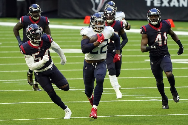 Tennessee Titans running back Derrick Henry (22) runs for a touchdown as Houston Texans' Jacob Martin (54) and Zach Cunningham (41) defend during the first half of an NFL football game Sunday, Jan. 3, 2021, in Houston. (AP Photo/Eric Christian Smith)
