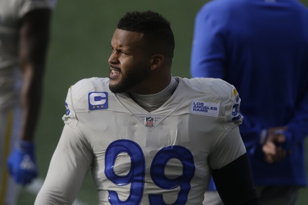 Los Angeles Rams defensive lineman Aaron Donald (99) on the sideline before the first half of an NFL football game against the Seattle Seahawks, Sunday, Dec. 27, 2020, in Seattle. (AP Photo/Scott Eklund)