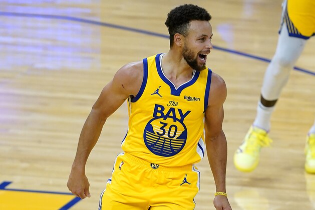 Golden State Warriors guard Stephen Curry (30) smiles after scoring his 62 points during the second half of an NBA basketball game against the Portland Trail Blazers in San Francisco, Sunday, Jan. 3, 2021. (AP Photo/Tony Avelar)