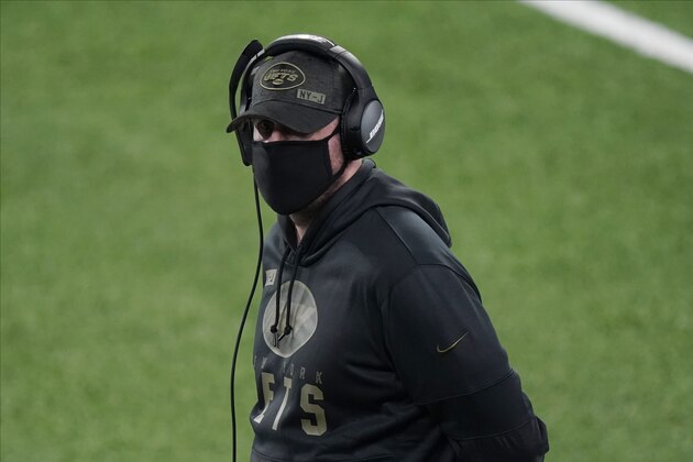 New York Jets head coach Adam Gase walks on the sideline during the first half of an NFL football game against the New England Patriots, Monday, Nov. 9, 2020, in East Rutherford, N.J. (AP Photo/Corey Sipkin)
