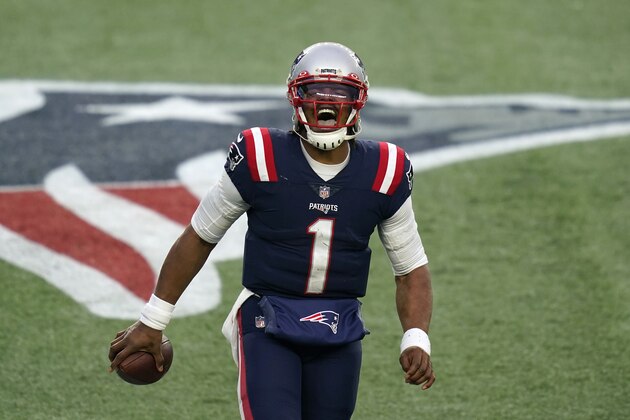 New England Patriots quarterback Cam Newton celebrates his touchdown pass to Devin Asiasi in the second half of an NFL football game against the New York Jets, Sunday, Jan. 3, 2021, in Foxborough, Mass. (AP Photo/Elise Amendola)