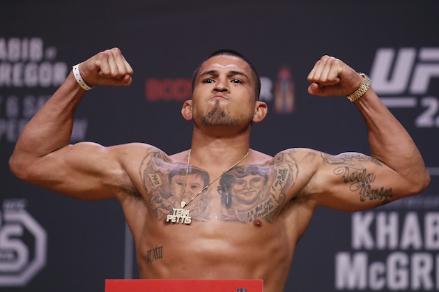 Anthony Pettis poses during a ceremonial weigh-in for the UFC 229 mixed martial arts fight Friday, Oct. 5, 2018, in Las Vegas. Pettis is scheduled to fight Tony Ferguson Saturday in Las Vegas. (AP Photo/John Locher)