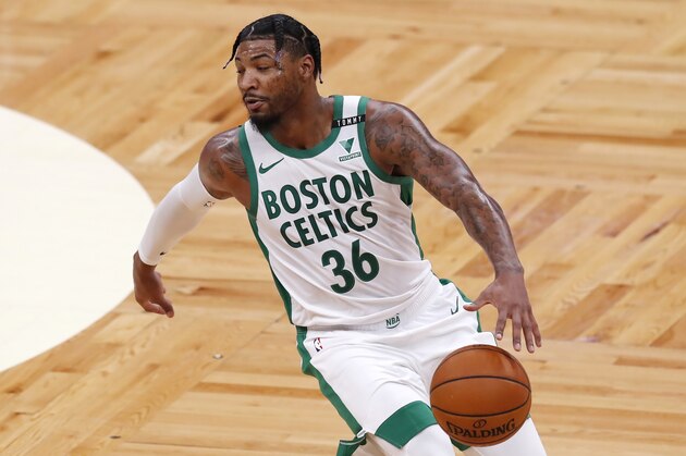 Boston Celtics' Marcus Smart plays against the Brooklyn Nets during the first half of an NBA basketball game, Friday, Dec. 25, 2020, in Boston. (AP Photo/Michael Dwyer)