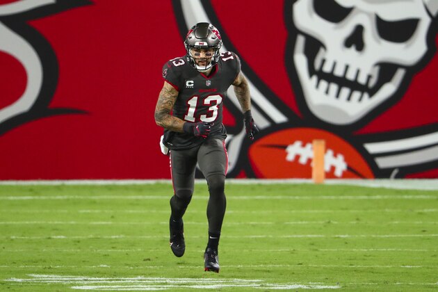 Tampa Bay Buccaneers wide receiver Mike Evans (13) runs a route during the first half of an NFL Football game against the Los Angeles Rams, Monday, Nov. 23, 2020, in Tampa, Fla. (AP Photo/Kevin Sabitus)