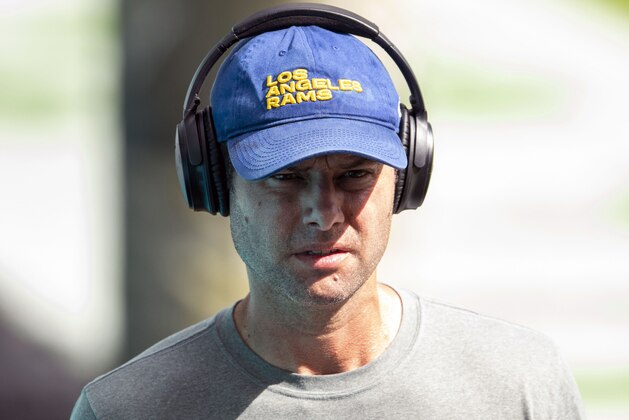 FILE - In this Sunday, Nov. 1, 2020 file photo, Los Angeles Rams defensive coordinator Brandon Staley watches his players before an NFL football game against the Miami Dolphins in Miami Gardens, Fla. Brandon Staley has only been the Los Angeles Rams' defensive coordinator for 13 games, and everybody already knows he could be on his way up. The 37-year-old Staley's name is prominent in NFL circles this month as the league's less successful teams plot their next head coaching hire.(AP Photo/Doug Murray, File)