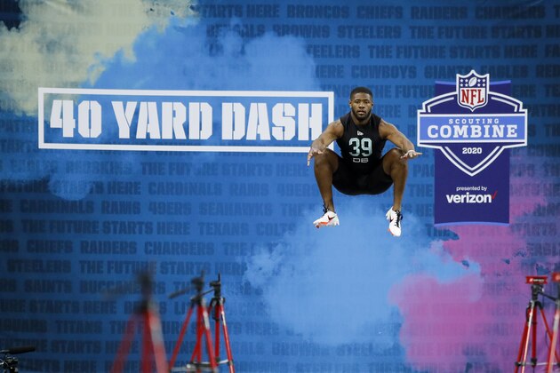 Utah defensive back Terrell Burgess prepares to run the 40-yard dash at the NFL football scouting combine in Indianapolis, Sunday, March 1, 2020. (AP Photo/Charlie Neibergall)