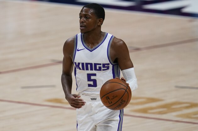 Sacramento Kings guard De'Aaron Fox (5) in the second half of an NBA basketball game Wednesday, Dec. 23, 2020, in Denver. The Kings won 124-122 in overtime. (AP Photo/David Zalubowski)