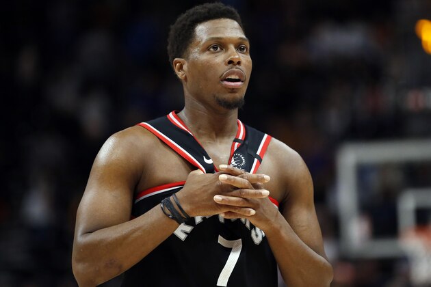 Toronto Raptors guard Kyle Lowry (7) looks on in the second half of an NBA basketball game against the Utah Jazz, Monday, March 9, 2020, in Salt Lake City. (AP Photo/Rick Bowmer)