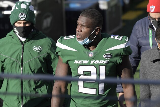 New York Jets' Frank Gore is evaluated by medical staff during the first half an NFL football game against the Las Vegas Raiders, Sunday, Dec. 6, 2020, in East Rutherford, N.J. (AP Photo/Bill Kostroun)