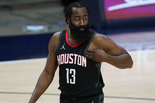 Houston Rockets guard James Harden (13) in the first half of an NBA basketball game Monday, Dec. 28, 2020, in Denver. (AP Photo/David Zalubowski)