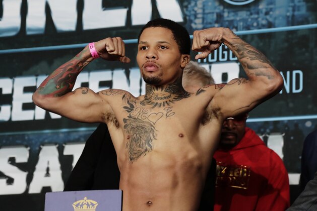 Gervonta Davis poses for photographs during the official weigh-in for a boxing match against Argentina's Jesus Cuellar Friday, April 20, 2018, in New York. Cuellar and Davis are schedule to fight Saturday for the vacant WBA junior lightweight title. (AP Photo/Frank Franklin II)