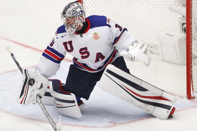 Goaltender Spencer Knight of the US makes a save during the U20 Ice Hockey Worlds quarterfinal match between Finland and the United States in Trinec, Czech Republic, Thursday, Jan. 2, 2020. (AP Photo/Petr David Josek)