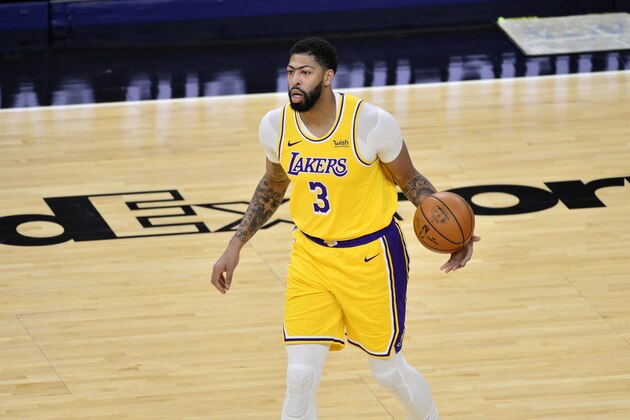 Los Angeles Lakers forward Anthony Davis (3) handles the ball in the first half of an NBA basketball game against the Memphis Grizzlies Tuesday, Jan. 5, 2021, in Memphis, Tenn. (AP Photo/Brandon Dill)