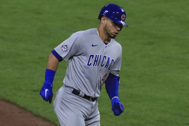 Chicago Cubs' Willson Contreras runs the bases after hitting two-run home run in the ninth inning during a baseball game against the Cincinnati Reds in Cincinnati, Friday, Aug. 28, 2020. (AP Photo/Aaron Doster)