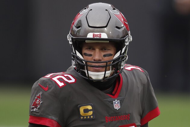 Tampa Bay Buccaneers quarterback Tom Brady (12) runs off the field after a touchdown against the Atlanta Falcons during an NFL football game Sunday, Jan. 3, 2021, in Tampa, Fla. The Buccaneers won the game 44-27. (Jeff Haynes/AP Images for Panini)