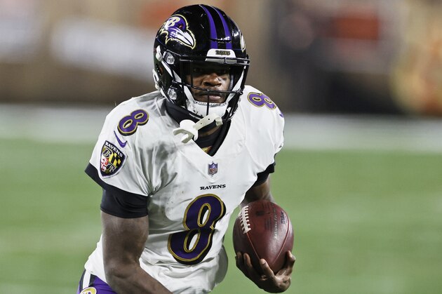Baltimore Ravens quarterback Lamar Jackson (8) rushes during the first half of an NFL football game against the Cleveland Browns, Monday, Dec. 14, 2020, in Cleveland. (AP Photo/Ron Schwane)