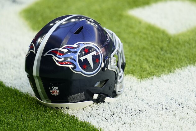 A Tennessee Titans helmet sits on the field during pregame warmups before an NFL football game against the Houston Texans, Sunday, Jan. 3, 2021, in Houston. (AP Photo/Matt Patterson)