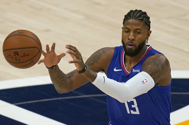 Los Angeles Clippers guard Paul George receives a pass during the first half of the team's NBA basketball game against the Utah Jazz on Friday, Jan. 1, 2021, in Salt Lake City. (AP Photo/Rick Bowmer)