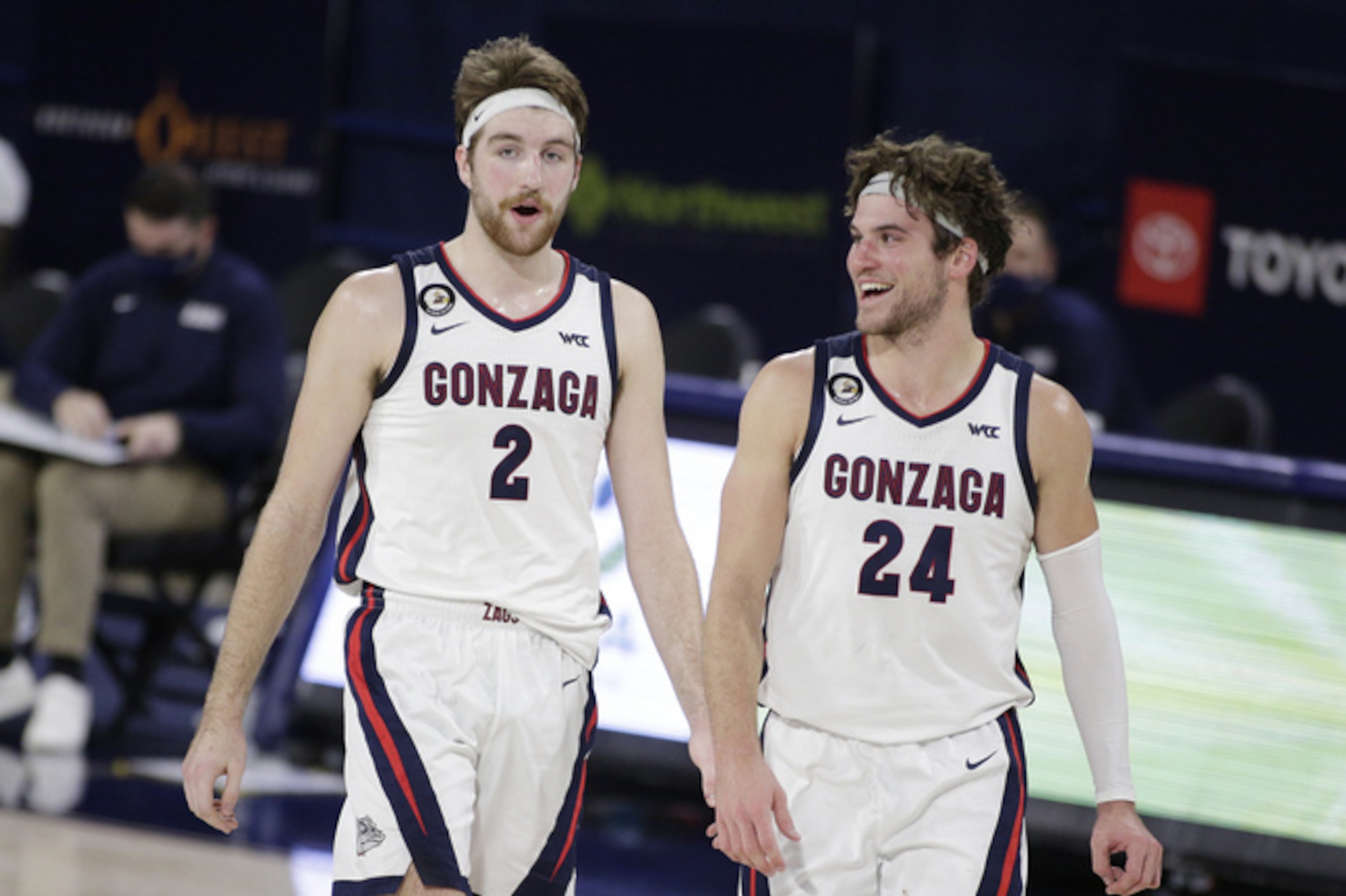 Gonzaga forward Drew Timme (2) and forward Corey Kispert (24) walk on the court during the second half of an NCAA college basketball game against San Francisco in Spokane, Wash., Saturday, Jan. 2, 2021. (AP Photo/Young Kwak)